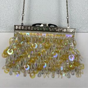vintage-style beaded evening handbag sequins beaded chain strap clasp closure.